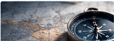 Compass over a map, representing AI strategy and direction
